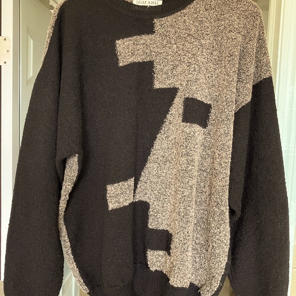 A man’s wool sweater in great condition warm and cozy.